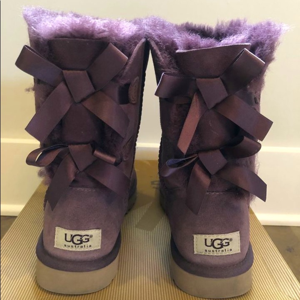 Authentic Ugg Short Bailey Bow boots. Color DPBD (deep purple) in size 7